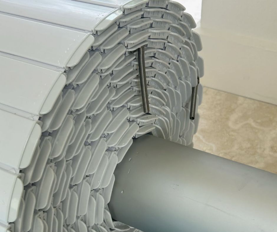 close up image of overflow guides on retracted hard pool cover