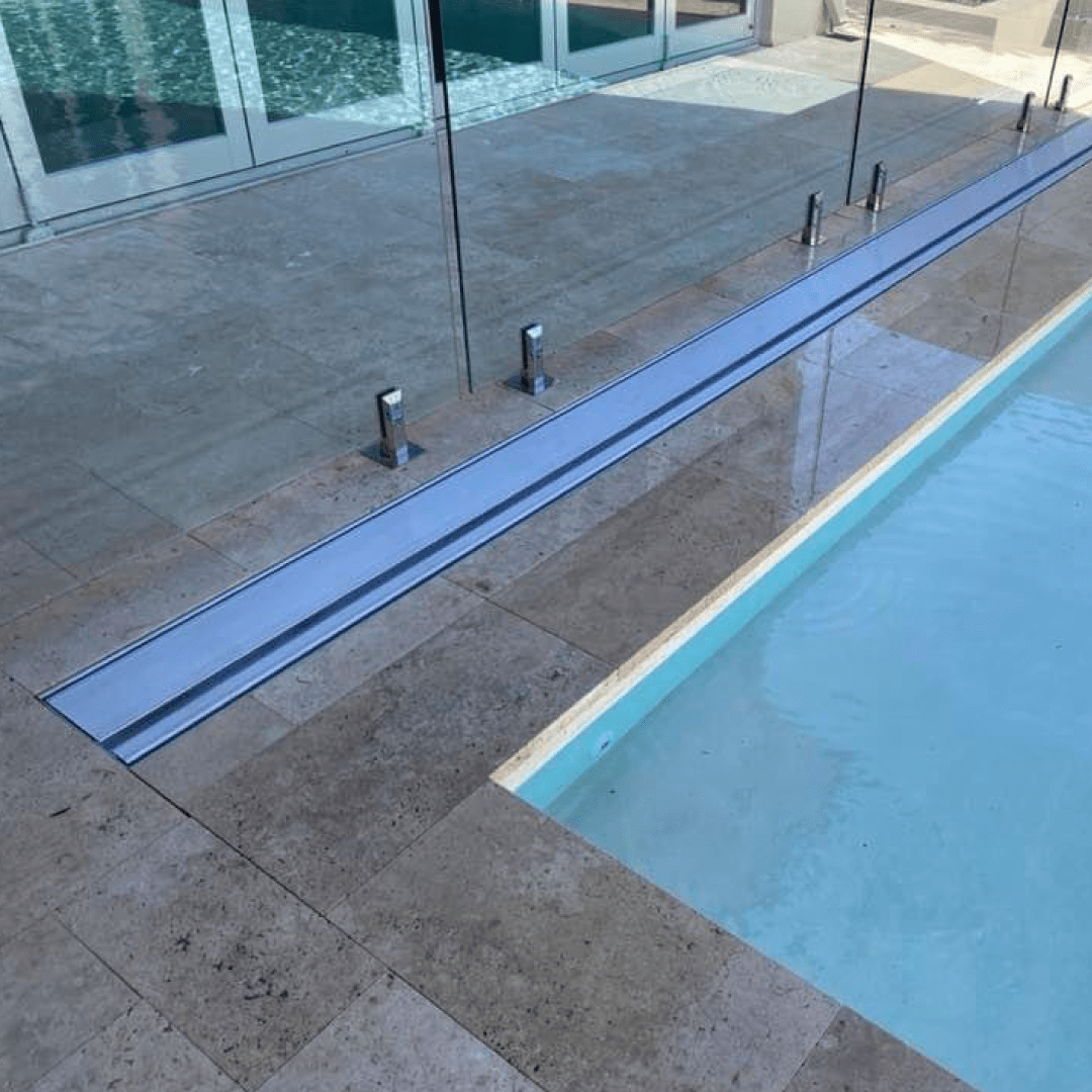  This frameless pool fence was installed nice and close to this Below Ground Box. A very space saving pool area! 