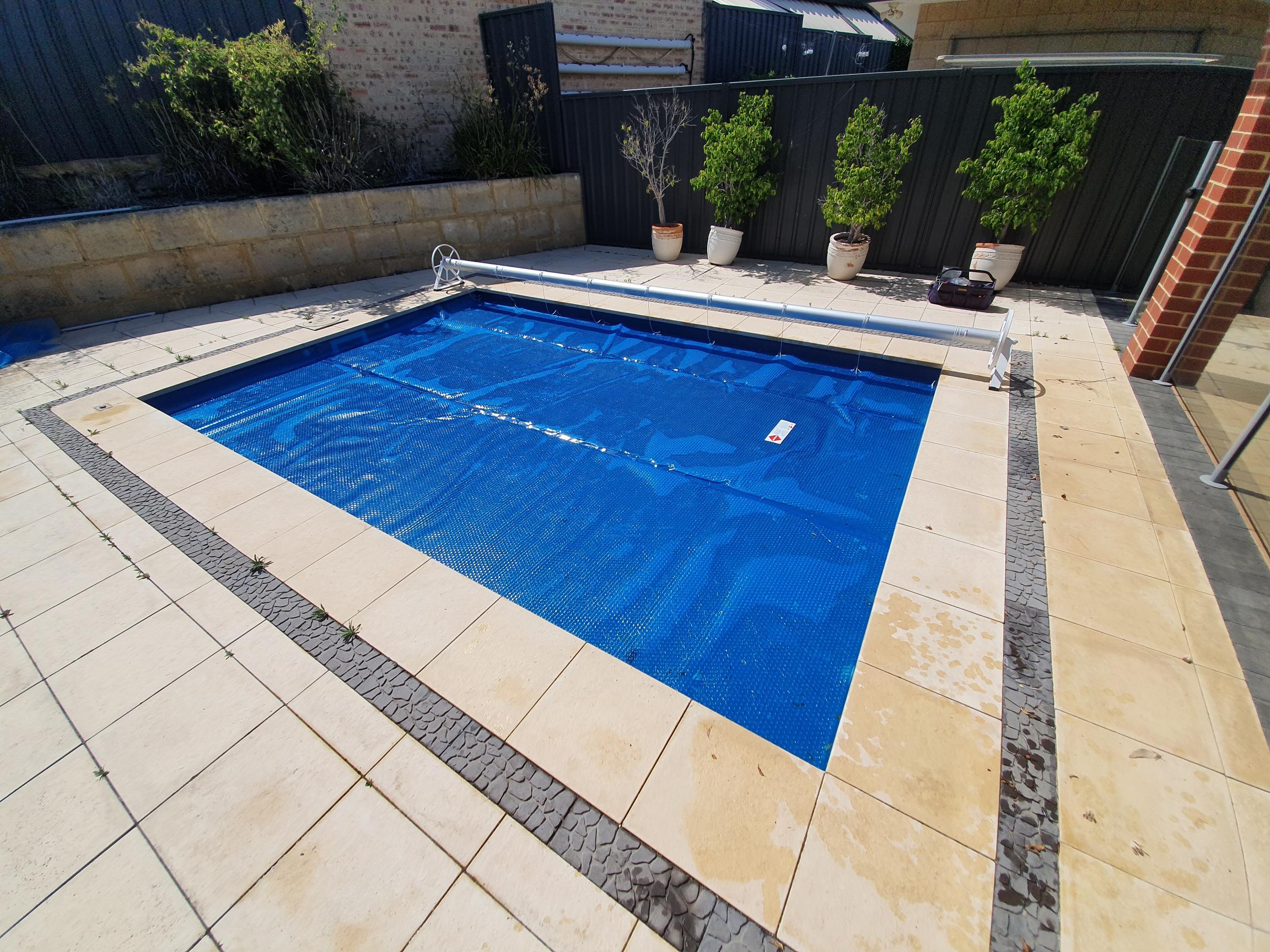 With smaller pools, a second option is to place your roller down the length of your pool.