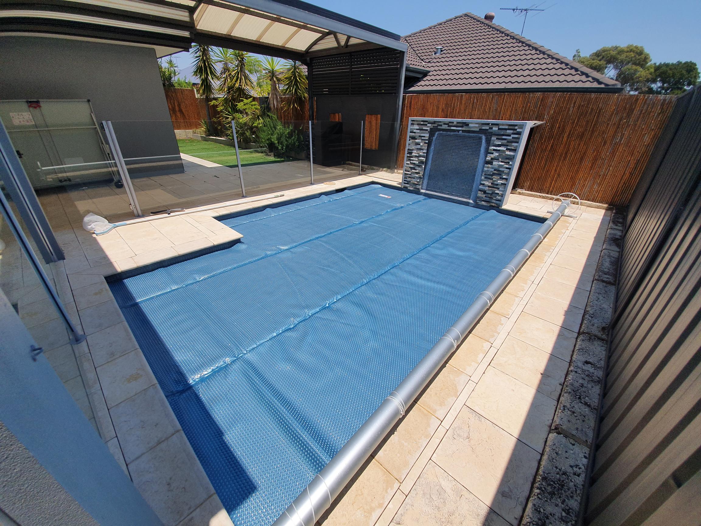 Due to spacing, this pool also required the roller to be placed down the length of the pool.